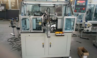 Hooked commutator armature winding machine